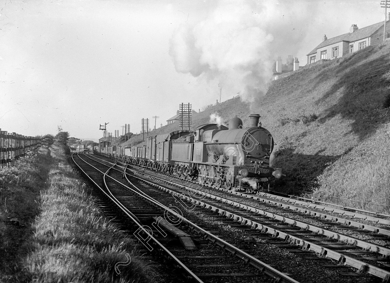 WD0908 
 ENGINE CLASS: L.N.W.R. ENGINE NUMBER: 9311 LOCATION: Hest Bank DATE: 23 May 1945 COMMENTS: 
 Keywords: 23 May 1945, 9311, Cooperline, Hest bank, L.N.W.R., Steam, WD Cooper, locomotives, railway photography, trains