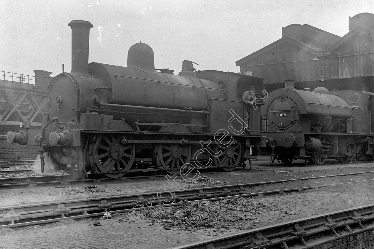 WD0912 
 ENGINE CLASS: L.N.W.R. ENGINE NUMBER: 27309, 7002 LOCATION: Edgehill DATE: 29 July 1939 COMMENTS: 
 Keywords: 27309, 29 July 1939, 7002, Cooperline, Edgehill, L.N.W.R., Steam, WD Cooper, locomotives, railway photography, trains