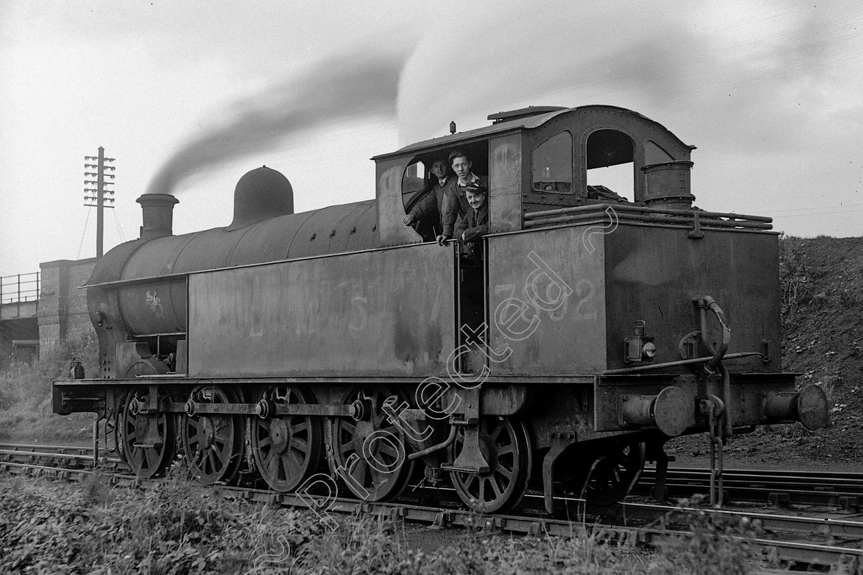 WD0927 
 ENGINE CLASS: L.N.W.R. ENGINE NUMBER: 7892 LOCATION: Patricroft DATE: 22 August 1946 COMMENTS: 
 Keywords: 22 August 1946, 7892, Cooperline, L.N.W.R., Patricroft, Steam, WD Cooper, locomotives, railway photography, trains