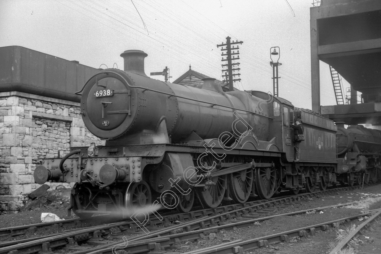 WD2825 
 ENGINE CLASS: GWR ENGINE NUMBER: 6938 LOCATION: Mold DATE: 27 May 1964 COMMENTS: 
 Keywords: 27 May 1964, 6938, Cooperline, GWR, Mold, Steam, WD Cooper, locomotives, railway photography, trains