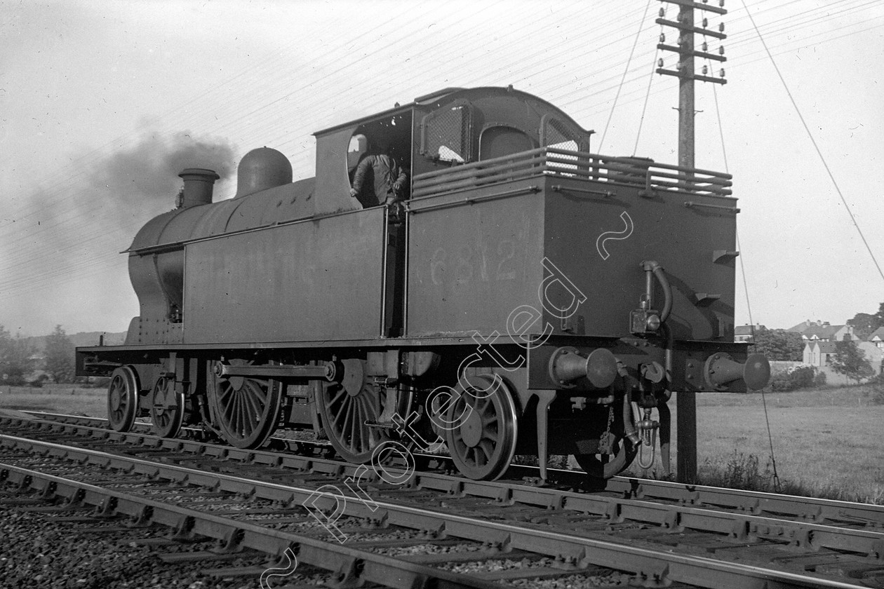 WD0910 
 ENGINE CLASS: L.N.W.R. ENGINE NUMBER: 6812 LOCATION: Hest Bank DATE: 02 June 1939 COMMENTS: 
 Keywords: 02 June 1939, 6812, Cooperline, Hest bank, L.N.W.R., Steam, WD Cooper, locomotives, railway photography, trains