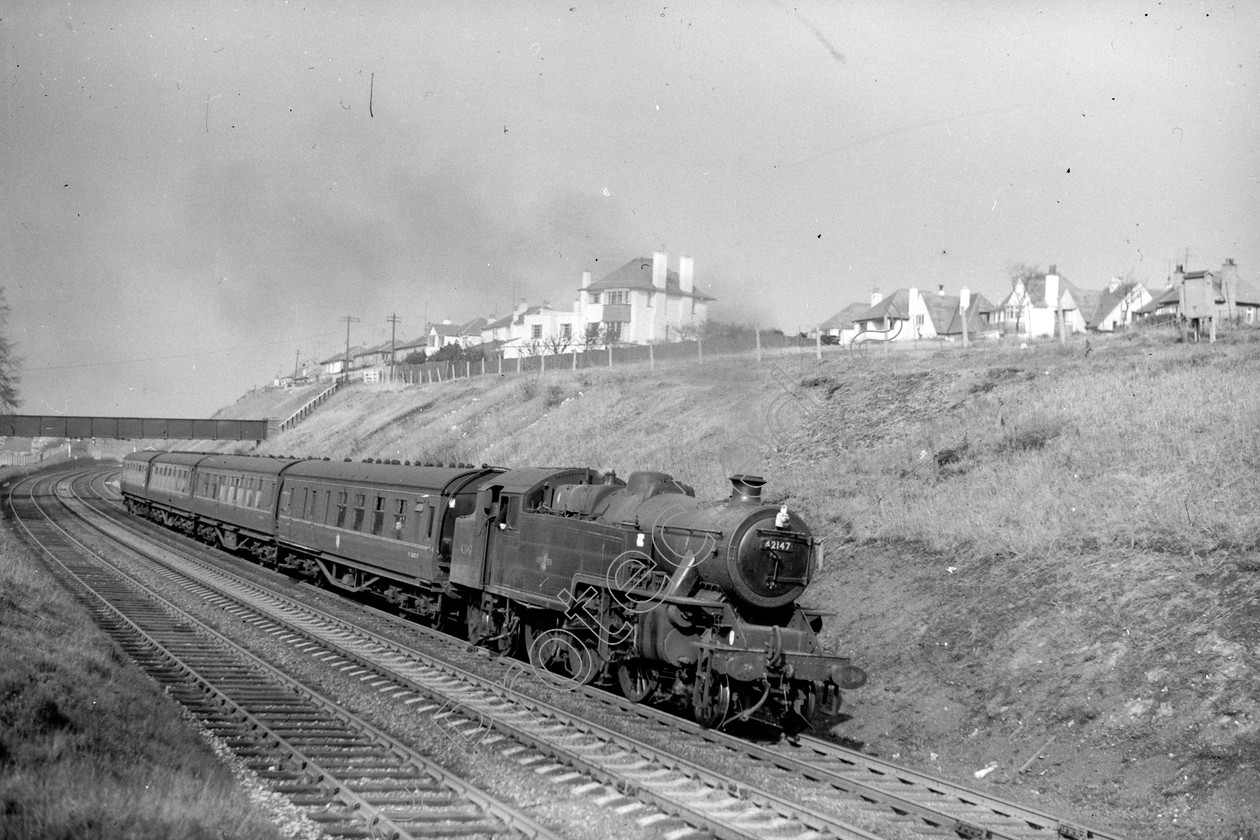 WD1013 
 ENGINE CLASS: 2-6-4 Tanks ENGINE NUMBER: 42147 LOCATION: Hest Bank DATE: 18 April 1964 COMMENTS: 
 Keywords: 18 April 1964, 2-6-4 Tanks, 42147, Cooperline, Hest bank, Steam, WD Cooper, locomotives, railway photography, trains