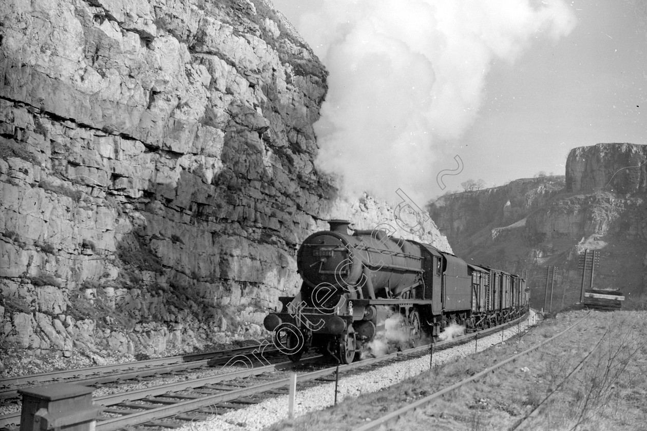 WD2007 
 ENGINE CLASS: Stanier Class 8 2-8-0 ENGINE NUMBER: 48081 LOCATION: Cheedale DATE: 23 March 1963 COMMENTS: 
 Keywords: 23 March 1963, 48081, Cheedale, Cooperline, Stanier Class 8 2-8-0, Steam, WD Cooper, locomotives, railway photography, trains