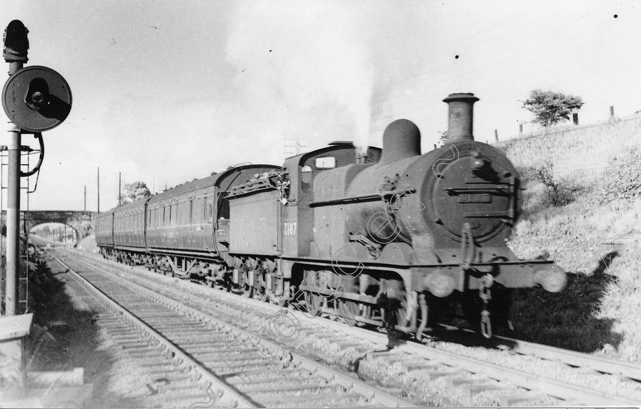 WD0731 
 ENGINE CLASS: Class 4 0-6-0 ENGINE NUMBER: 3187 LOCATION: Hest Bank DATE: 05 June 1949 COMMENTS: 
 Keywords: 05 June 1949, 3187, Class 4 0-6-0, Cooperline, Hest bank, Steam, WD Cooper, locomotives, railway photography, trains