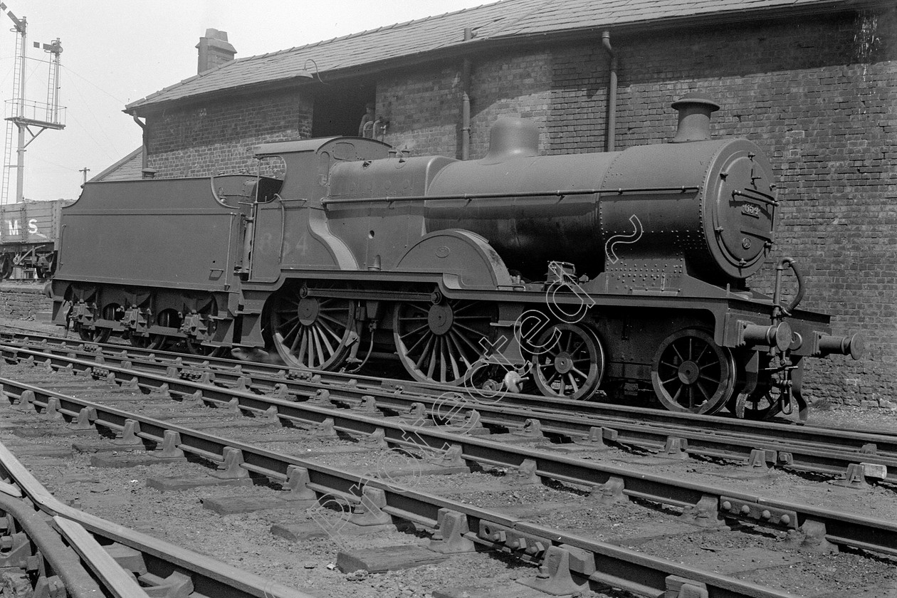 WD0552 
 ENGINE CLASS: Class 2 4-4-0 ENGINE NUMBER: 654 LOCATION: Tebay DATE: 02 June 1939 COMMENTS: 
 Keywords: 02 June 1939, 654, Class 2 4-4-0, Cooperline, Steam, Tebay, WD Cooper, locomotives, railway photography, trains