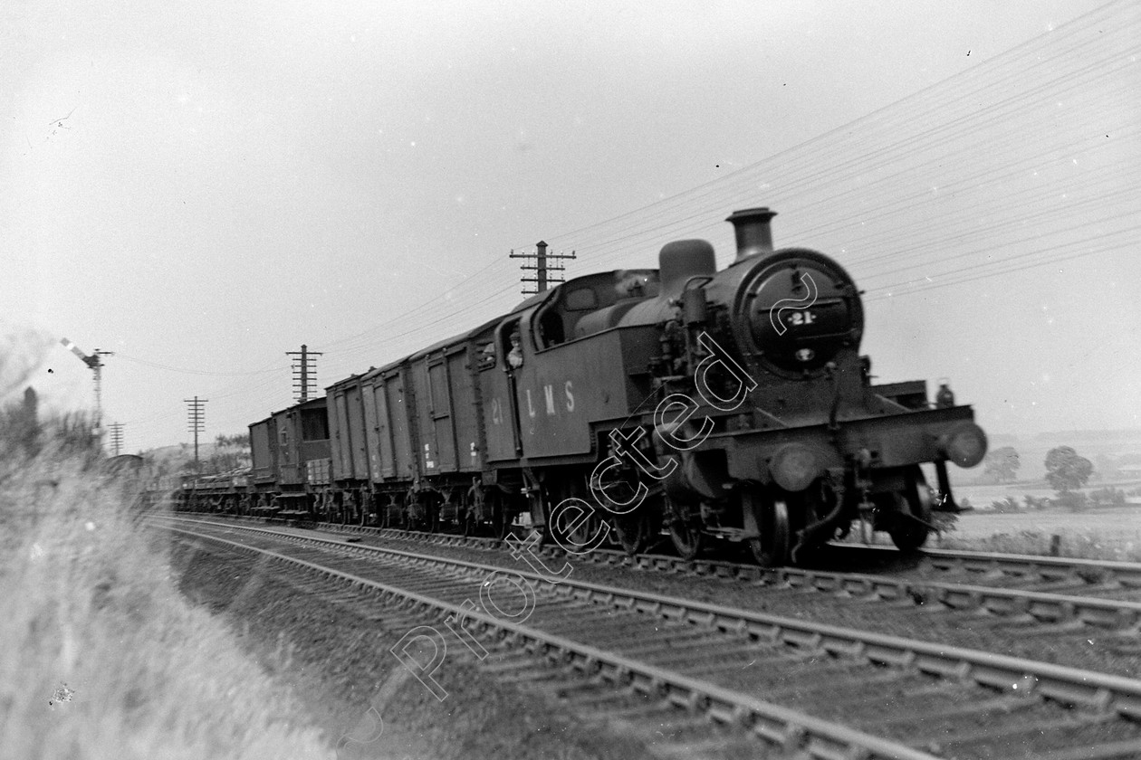 WD0990 
 ENGINE CLASS: MISC ENGINE NUMBER: 21 LOCATION: Lower Shap DATE: 28 July 1947 COMMENTS: 
 Keywords: 21, 28 July 1947, Cooperline, MISC, Steam, WD Cooper, locomotives, lower shap, railway photography, trains