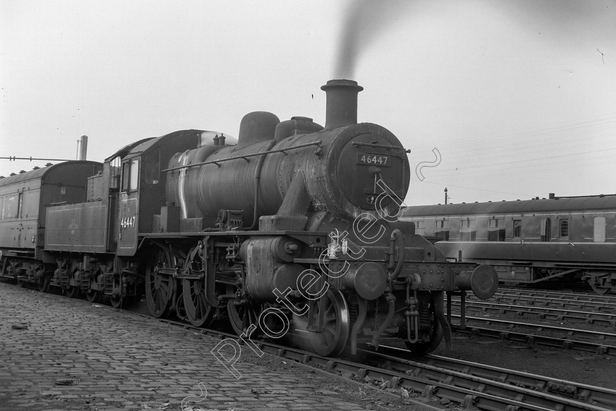 WD0877 
 ENGINE CLASS: Ivatt 6400 & 3000 ENGINE NUMBER: 46447 LOCATION: Patricroft DATE: 23 June 1964 COMMENTS: 
 Keywords: 23 June 1964, 46447, Cooperline, Ivatt 6400 & 3000, Patricroft, Steam, WD Cooper, locomotives, railway photography, trains