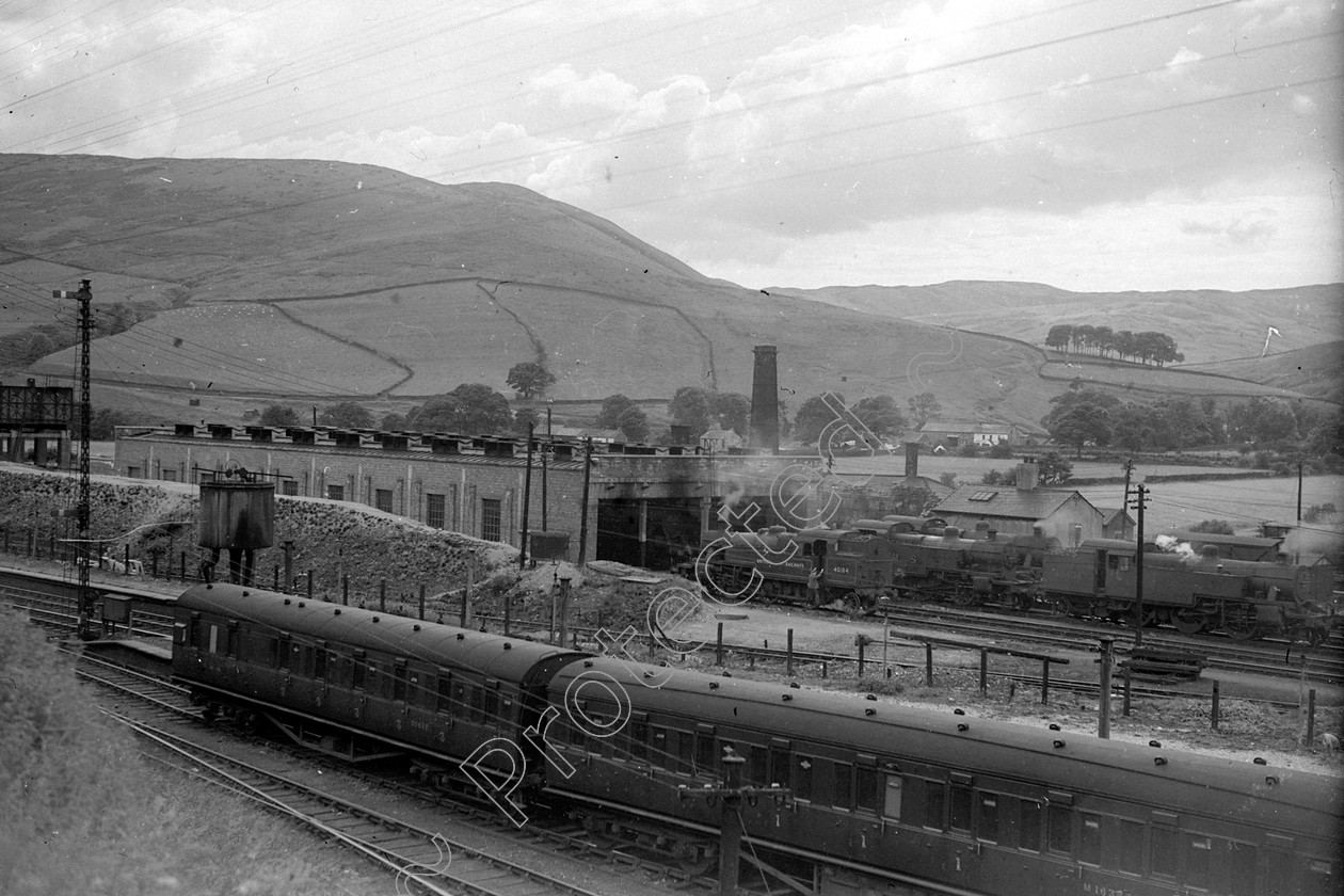 WD2759 
 ENGINE CLASS: Motive Power depots and cranes ENGINE NUMBER: LOCATION: Tebay DATE: 00.08.1950 COMMENTS: 
 Keywords: 00.08.1950, Cooperline, Motive Power depots and cranes, Steam, Tebay, WD Cooper, locomotives, railway photography, trains