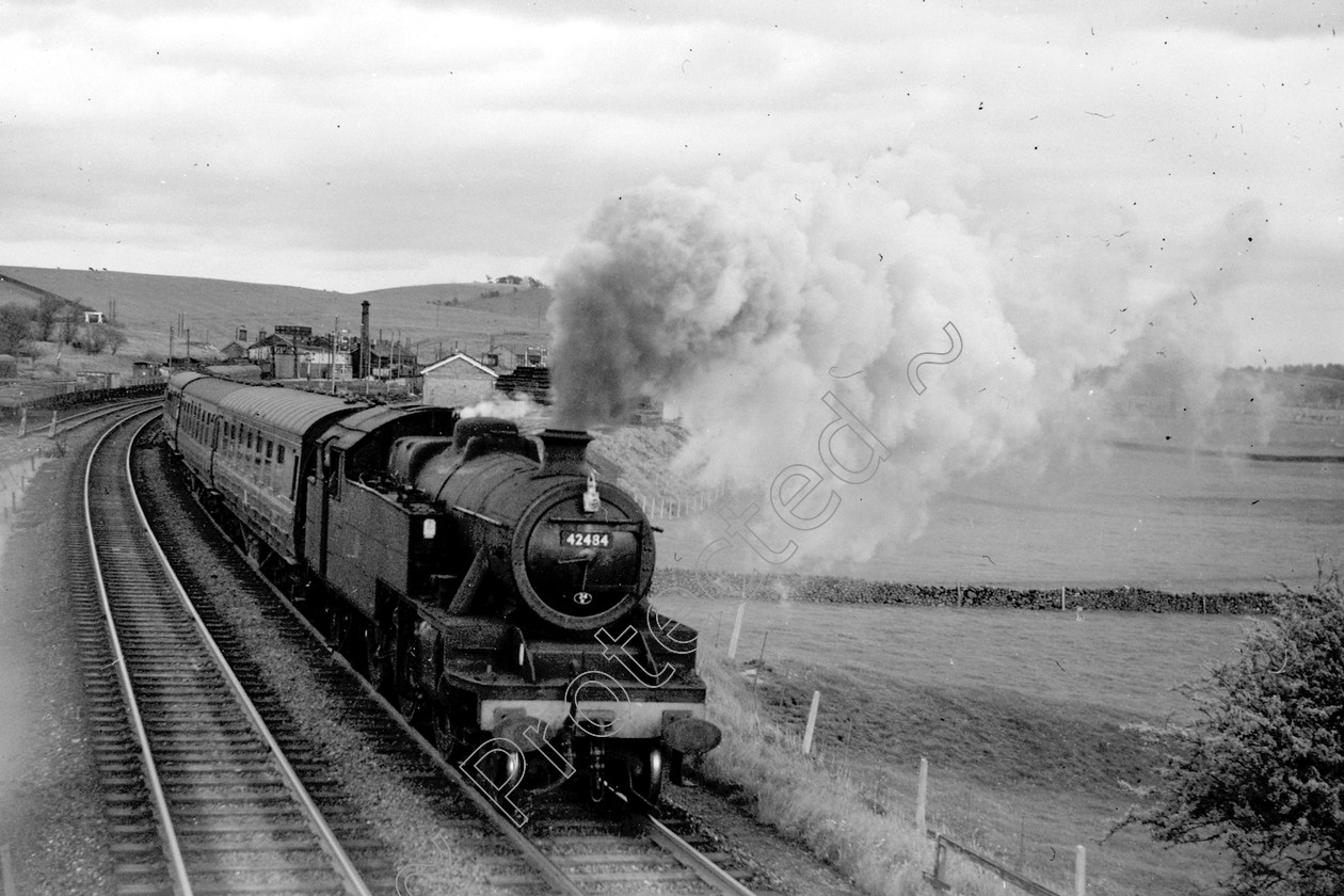 WD1055 
 ENGINE CLASS: 2-6-4 Tanks ENGINE NUMBER: 42484 LOCATION: Hellifield DATE: 25 May 1962 COMMENTS: 
 Keywords: 2-6-4 Tanks, 25 May 1962, 42484, Cooperline, Hellifield, Steam, WD Cooper, locomotives, railway photography, trains