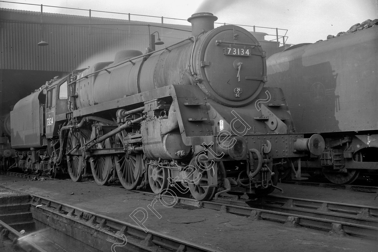 WD2449 
 ENGINE CLASS: BR 73000 4-6-0 ENGINE NUMBER: 73134 LOCATION: Patricroft DATE: 01 June 1963 COMMENTS: 
 Keywords: 01 June 1963, 73134, BR 73000 4-6-0, Cooperline, Patricroft, Steam, WD Cooper, locomotives, railway photography, trains