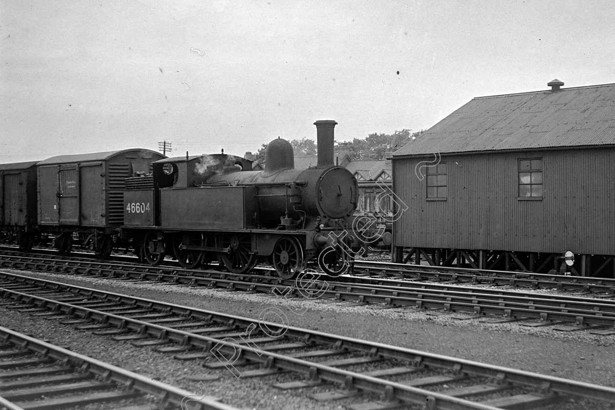 WD0943 
 ENGINE CLASS: L.N.W.R. ENGINE NUMBER: 46604 LOCATION: Llandudno Junction DATE: 00.05.1950 COMMENTS: 
 Keywords: 00.05.1950, 46604, Cooperline, L.N.W.R., Llandudno Junction, Steam, WD Cooper, locomotives, railway photography, trains