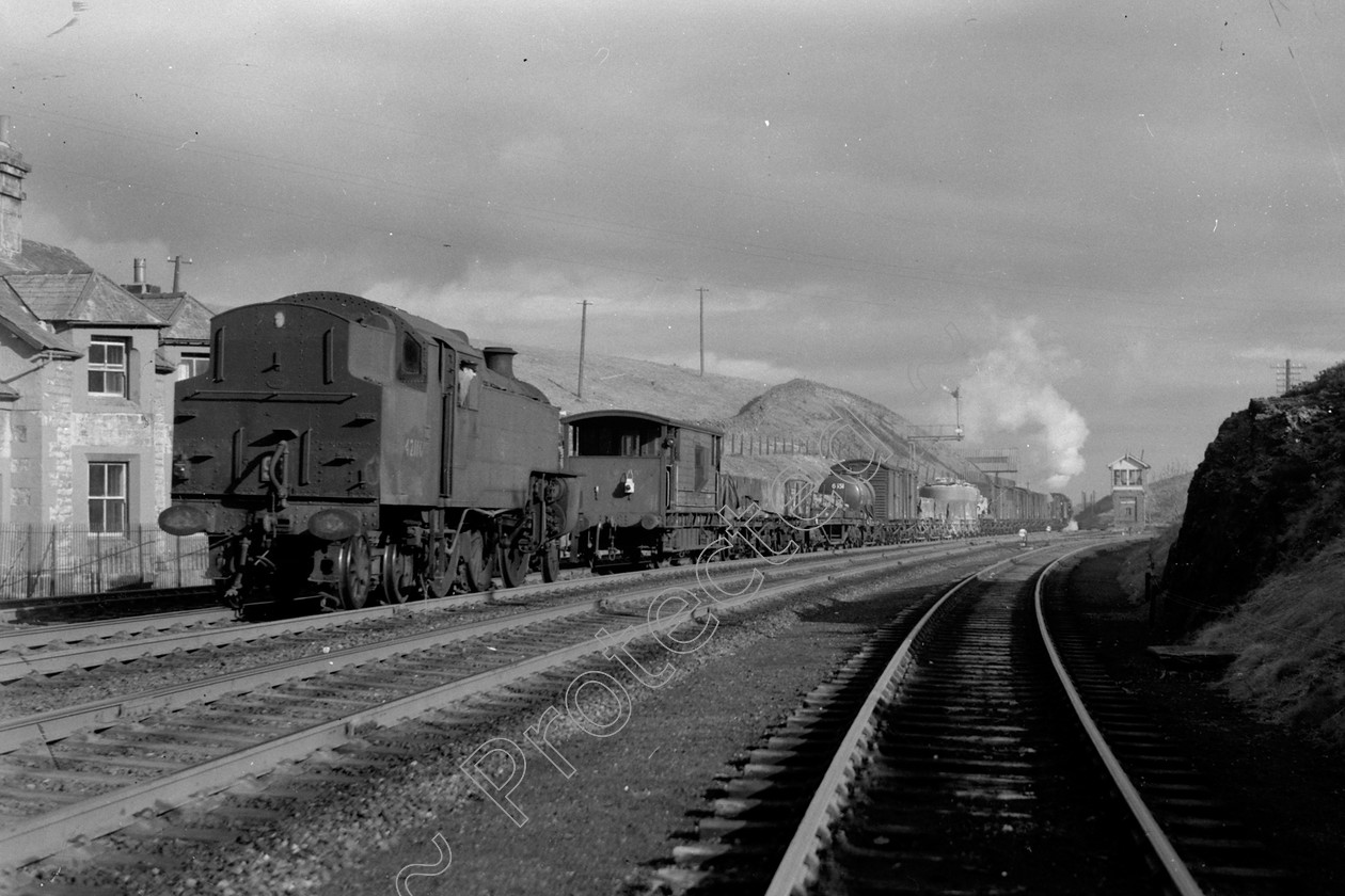 WD1010 
 ENGINE CLASS: 2-6-4 Tanks ENGINE NUMBER: 42110 LOCATION: Shap DATE: 30 April 1963 COMMENTS: banker dropping off 
 Keywords: 2-6-4 Tanks, 30 April 1963, 42110, Cooperline, Shap, Steam, WD Cooper, banker dropping off, locomotives, railway photography, trains