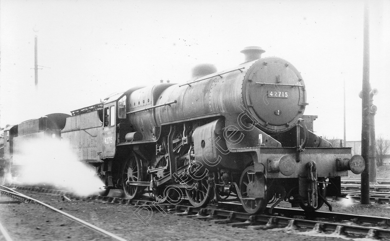 WD0614 
 ENGINE CLASS: Moguls 2-6-0 ENGINE NUMBER: 42715 LOCATION: Patricroft DATE: 01 March 1964 COMMENTS: 
 Keywords: 01 March 1964, 42715, Cooperline, Moguls 2-6-0, Patricroft, Steam, WD Cooper, locomotives, railway photography, trains