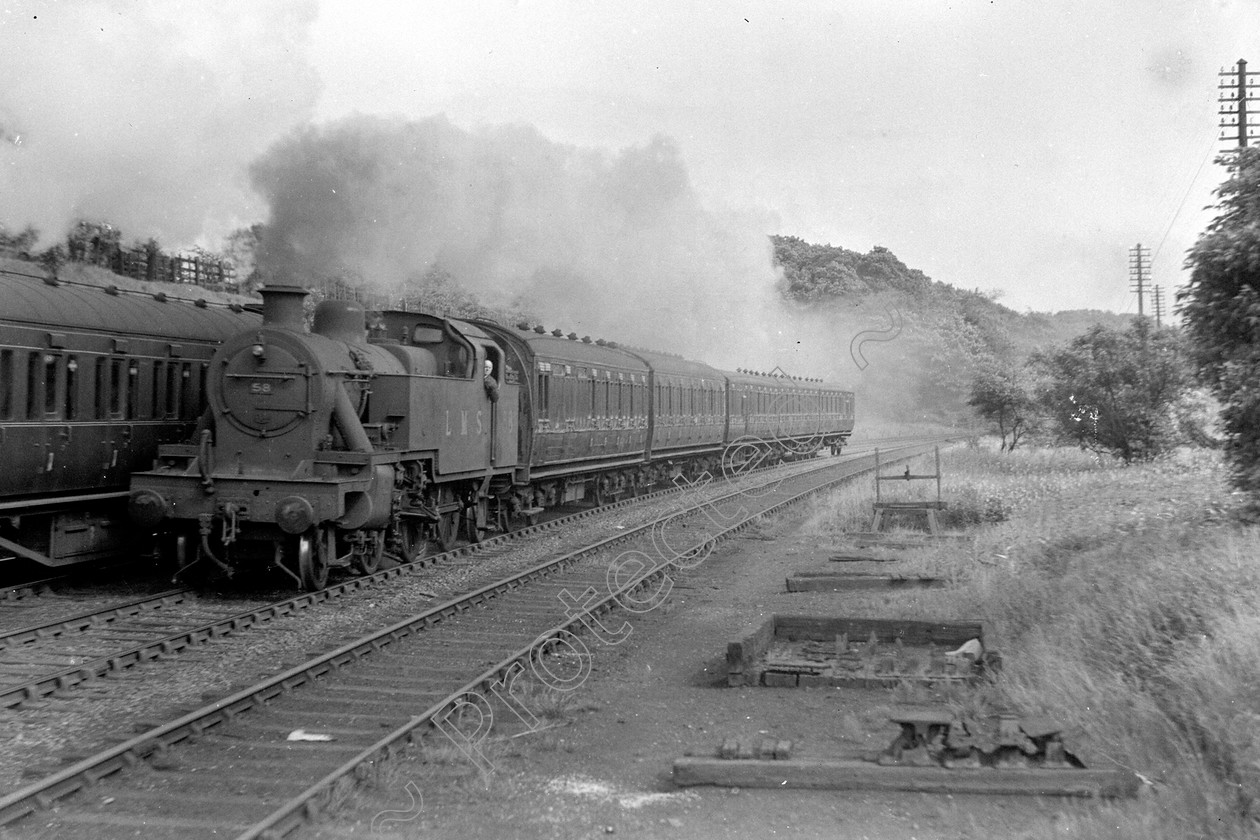 WD0988 
 ENGINE CLASS: MISC ENGINE NUMBER: 58 LOCATION: Roe Green DATE: 11 June 1947 COMMENTS: 
 Keywords: 11 June 1947, 58, Cooperline, MISC, Roe Green, Steam, WD Cooper, locomotives, railway photography, trains