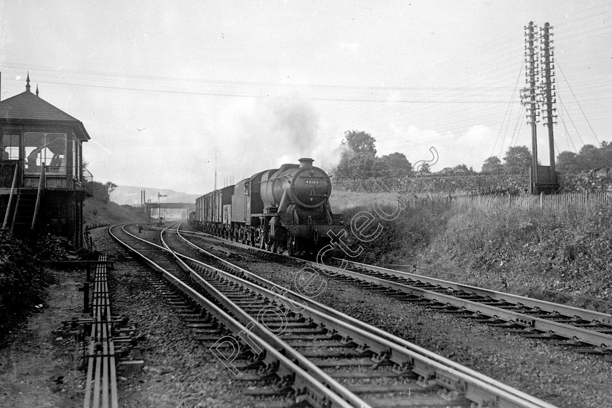 WD2011 
 ENGINE CLASS: Stanier Class 8 2-8-0 ENGINE NUMBER: 48104 LOCATION: Settle junction DATE: 00.07.1952 COMMENTS: 
 Keywords: 00.07.1952, 48104, Cooperline, Settle junction, Stanier Class 8 2-8-0, Steam, WD Cooper, locomotives, railway photography, trains