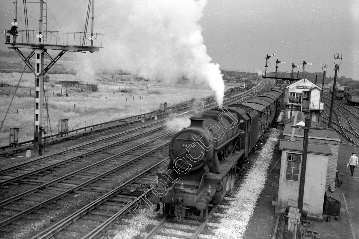 WD2024 
 ENGINE CLASS: Stanier Class 8 2-8-0 ENGINE NUMBER: 48275 LOCATION: Winwick DATE: 29 August 1963 COMMENTS: 
 Keywords: 29 August 1963, 48275, Cooperline, Stanier Class 8 2-8-0, Steam, WD Cooper, Winwick, locomotives, railway photography, trains