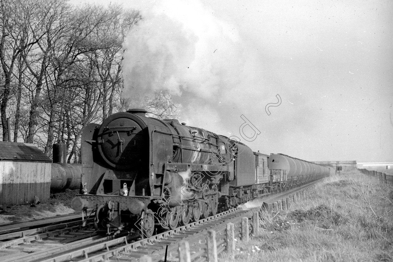 WD2649 
 ENGINE CLASS: BR Class 9 ENGINE NUMBER: 92092 LOCATION: Brock DATE: 30 April 1966 COMMENTS: 
 Keywords: 30 April 1966, 92092, BR Class 9, Brock, Cooperline, Steam, WD Cooper, locomotives, railway photography, trains