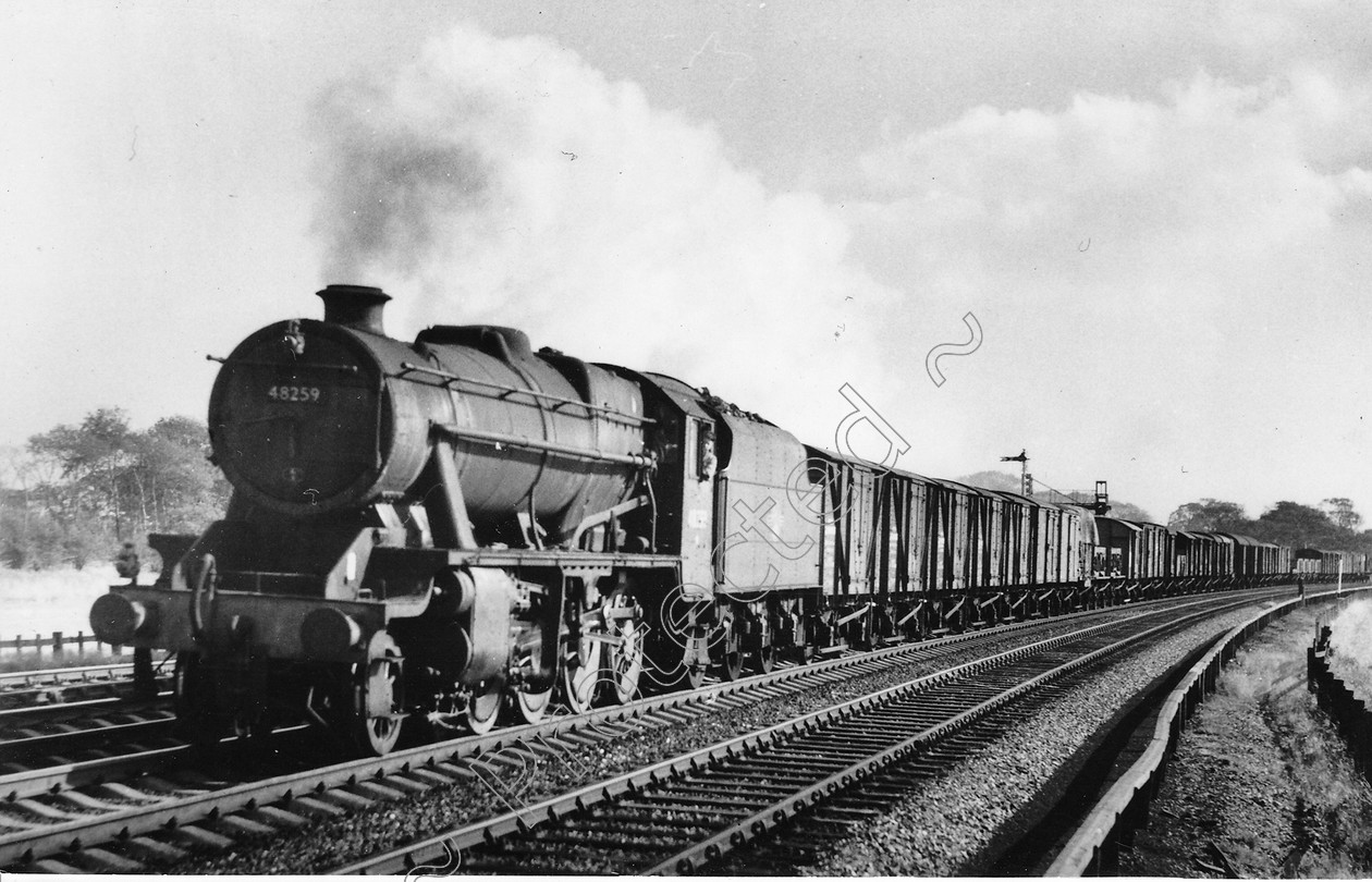 WD2023 
 ENGINE CLASS: Stanier Class 8 2-8-0 ENGINE NUMBER: 48259 LOCATION: Winwick DATE: 05 October 1962 COMMENTS: 
 Keywords: 05 October 1962, 48259, Cooperline, Stanier Class 8 2-8-0, Steam, WD Cooper, Winwick, locomotives, railway photography, trains