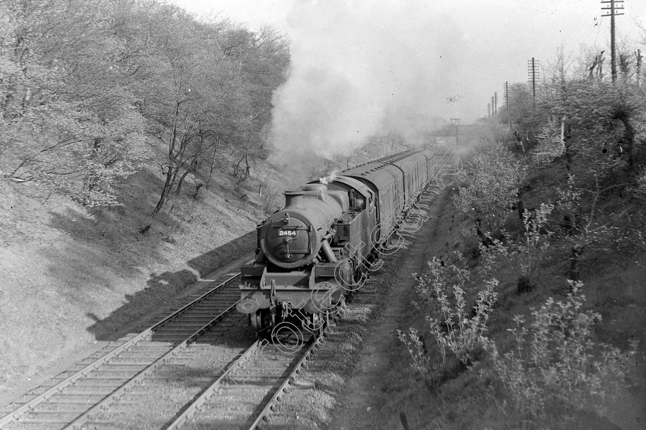 WD1006 
 ENGINE CLASS: 2-6-4 Tanks ENGINE NUMBER: 2454 LOCATION: Worsley DATE: 25 April 1944 COMMENTS: 
 Keywords: 2-6-4 Tanks, 2454, 25 April 1944, Cooperline, Steam, WD Cooper, Worsley, locomotives, railway photography, trains