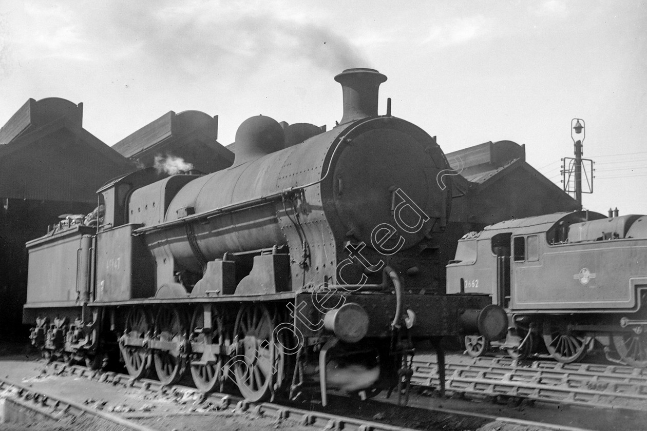 WD0964 
 ENGINE CLASS: L.N.W.R. ENGINE NUMBER: 49147 LOCATION: Patricroft DATE: 23 May 1959 COMMENTS: 
 Keywords: 23 May 1959, 49147, Cooperline, L.N.W.R., Patricroft, Steam, WD Cooper, locomotives, railway photography, trains