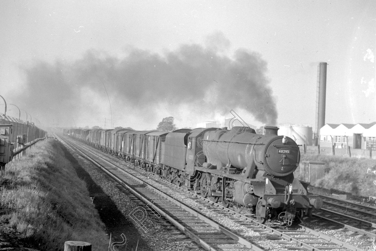 WD2028 
 ENGINE CLASS: Stanier Class 8 2-8-0 ENGINE NUMBER: 48295 LOCATION: Leyland DATE: 23 September 1964 COMMENTS: 
 Keywords: 23 September 1964, 48295, Cooperline, Leyland, Stanier Class 8 2-8-0, Steam, WD Cooper, locomotives, railway photography, trains