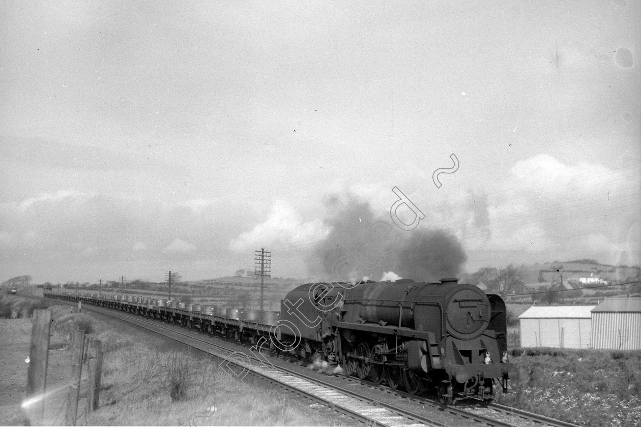 WD2644 
 ENGINE CLASS: BR Class 9 ENGINE NUMBER: 92080 LOCATION: Lancaster DATE: 09 March 1966 COMMENTS: 
 Keywords: 09 March 1966, 92080, BR Class 9, Cooperline, Lancaster, Steam, WD Cooper, locomotives, railway photography, trains