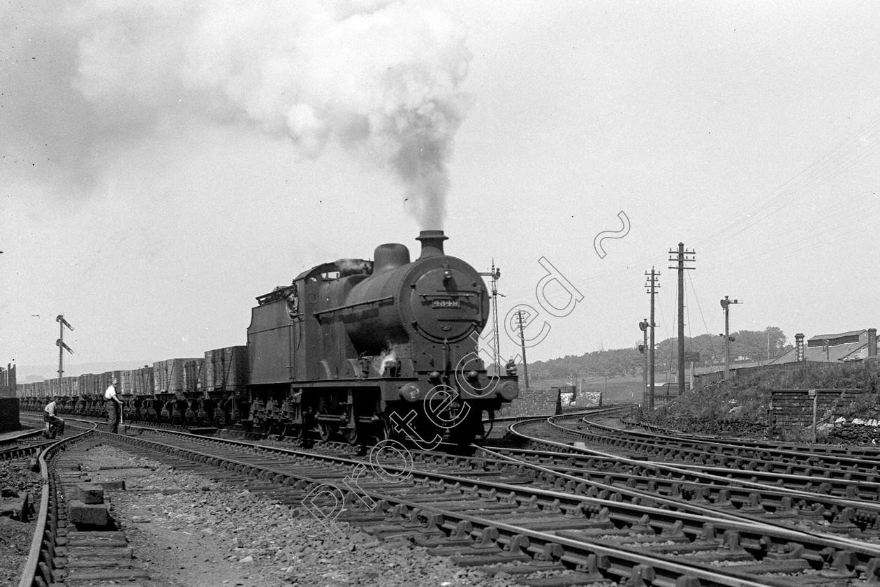 WD0703 
 ENGINE CLASS: Class 4 0-6-0 ENGINE NUMBER: 4349 LOCATION: Tebay DATE: 02 June 1939 COMMENTS: 
 Keywords: 02 June 1939, 4349, Class 4 0-6-0, Cooperline, Steam, Tebay, WD Cooper, locomotives, railway photography, trains