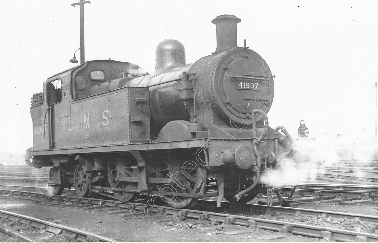 WD0987 
 ENGINE CLASS: MISC ENGINE NUMBER: 41907 LOCATION: Longsight DATE: 10 October 1951 COMMENTS: 
 Keywords: 10 October 1951, 41907, Cooperline, Longsight, MISC, Steam, WD Cooper, locomotives, railway photography, trains