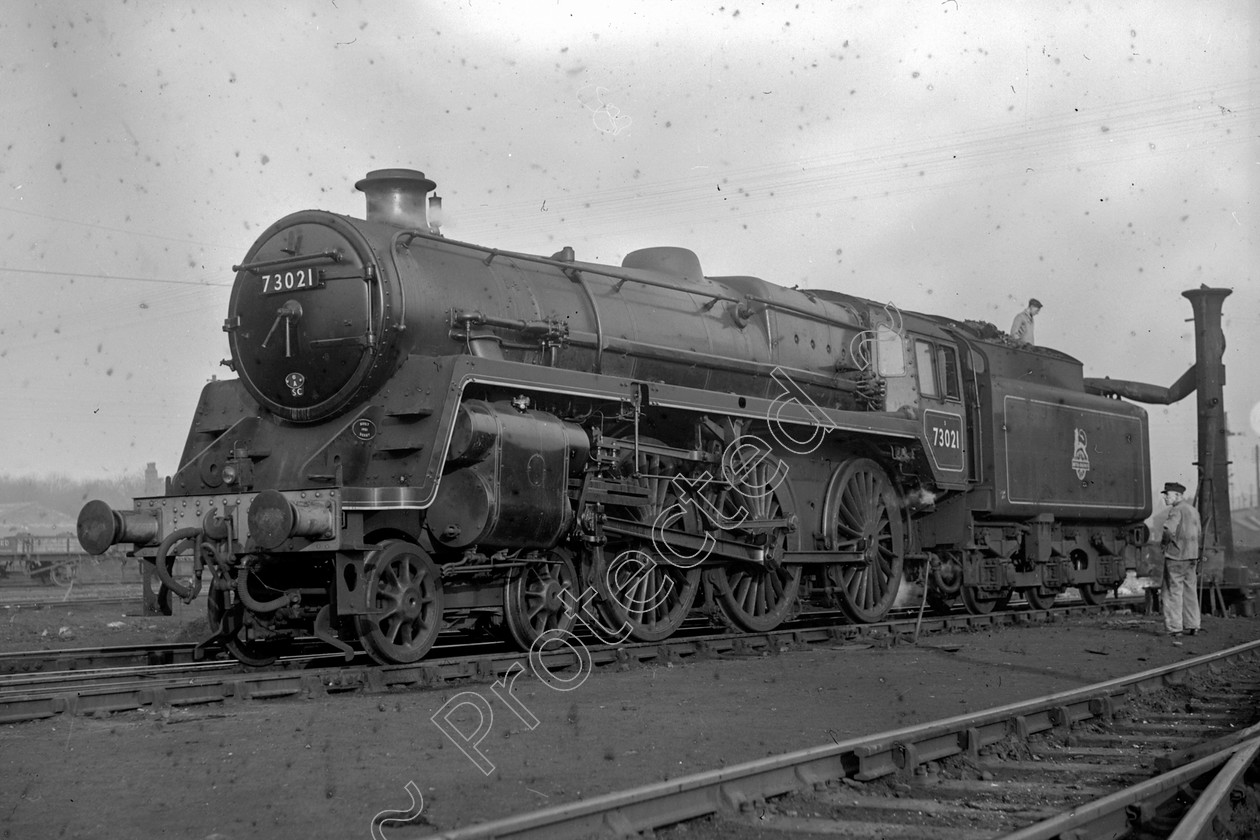 WD2405 
 ENGINE CLASS: BR 73000 4-6-0 ENGINE NUMBER: 73021 LOCATION: Patricroft DATE: 00.04.1952 COMMENTS: 
 Keywords: 00.04.1952, 73021, BR 73000 4-6-0, Cooperline, Patricroft, Steam, WD Cooper, locomotives, railway photography, trains