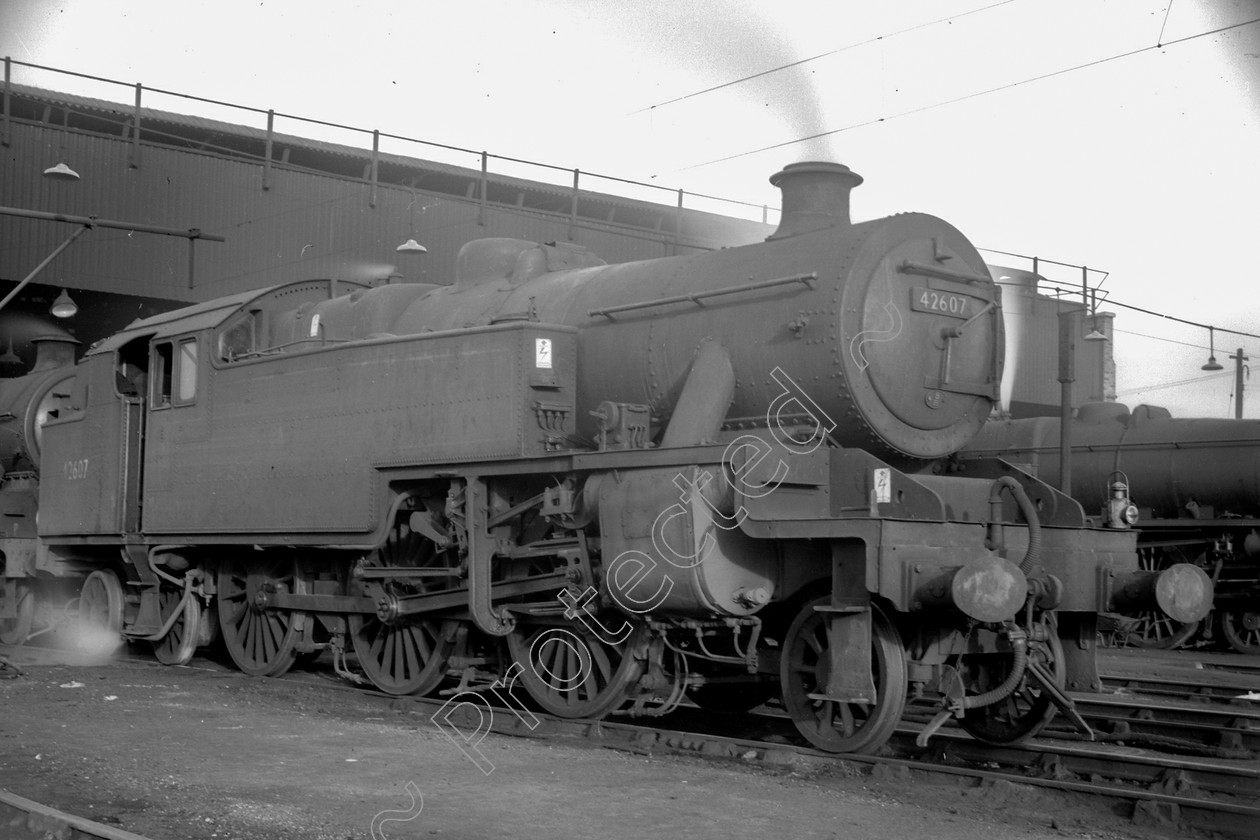 WD1074 
 ENGINE CLASS: 2-6-4 Tanks ENGINE NUMBER: 42607 LOCATION: Patricroft DATE: 13 February 1961 COMMENTS: 
 Keywords: 13 February 1961, 2-6-4 Tanks, 42607, Cooperline, Patricroft, Steam, WD Cooper, locomotives, railway photography, trains