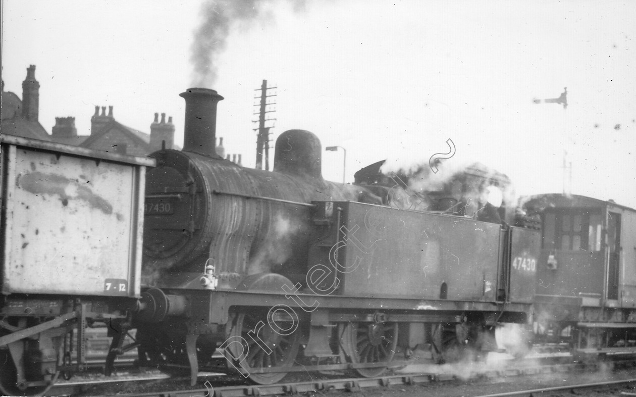 WD1355 
 ENGINE CLASS: 0-6-0 Tanks (Jinty) ENGINE NUMBER: 47430 LOCATION: Patricroft DATE: 13 December 1962 COMMENTS: 
 Keywords: 0-6-0 Tanks (Jinty), 13 December 1962, 47430, Cooperline, Patricroft, Steam, WD Cooper, locomotives, railway photography, trains