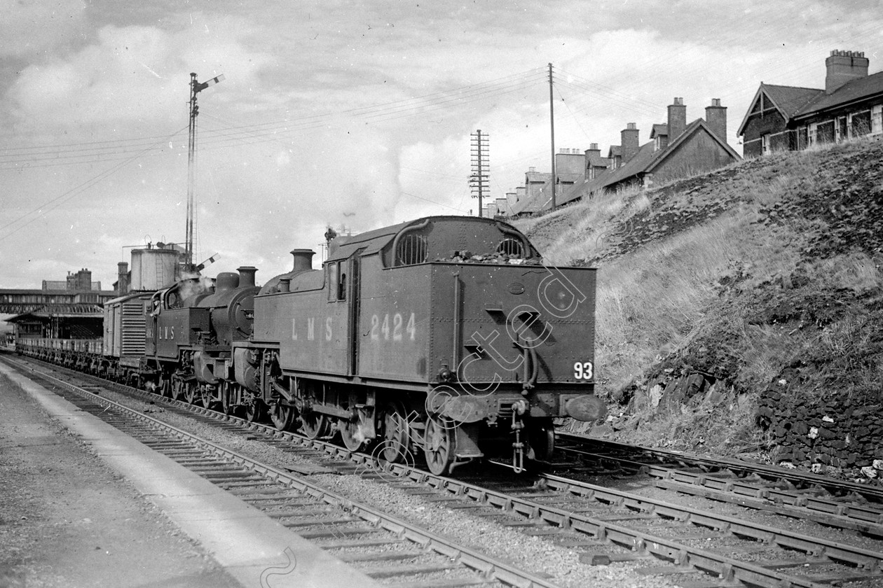 WD1044 
 ENGINE CLASS: 2-6-4 Tanks ENGINE NUMBER: 42424 LOCATION: Tebay DATE: 00.08.1949 COMMENTS: 
 Keywords: 00.08.1949, 2-6-4 Tanks, 42424, Cooperline, Steam, Tebay, WD Cooper, locomotives, railway photography, trains