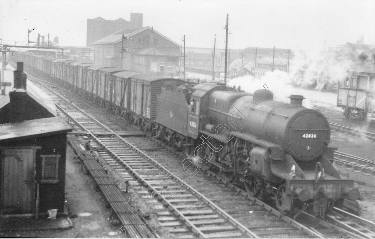 WD0643 
 ENGINE CLASS: Moguls 2-6-0 ENGINE NUMBER: 42826 LOCATION: Patricroft DATE: 23 November 1963 COMMENTS: 
 Keywords: 23 November 1963, 42826, Cooperline, Moguls 2-6-0, Patricroft, Steam, WD Cooper, locomotives, railway photography, trains