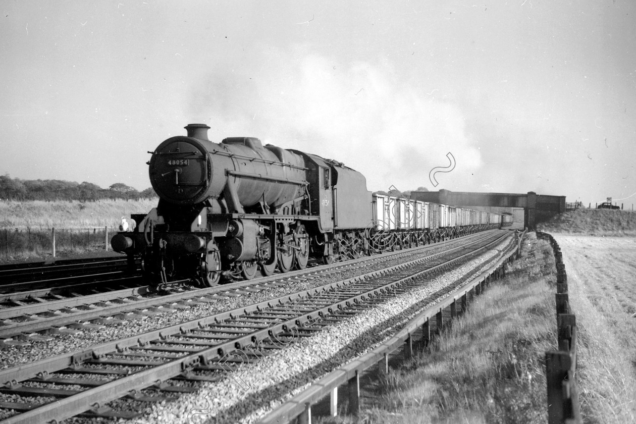 WD2003 
 ENGINE CLASS: Stanier Class 8 2-8-0 ENGINE NUMBER: 48054 LOCATION: Winwick DATE: 05 October 1962 COMMENTS: 
 Keywords: 05 October 1962, 48054, Cooperline, Stanier Class 8 2-8-0, Steam, WD Cooper, Winwick, locomotives, railway photography, trains