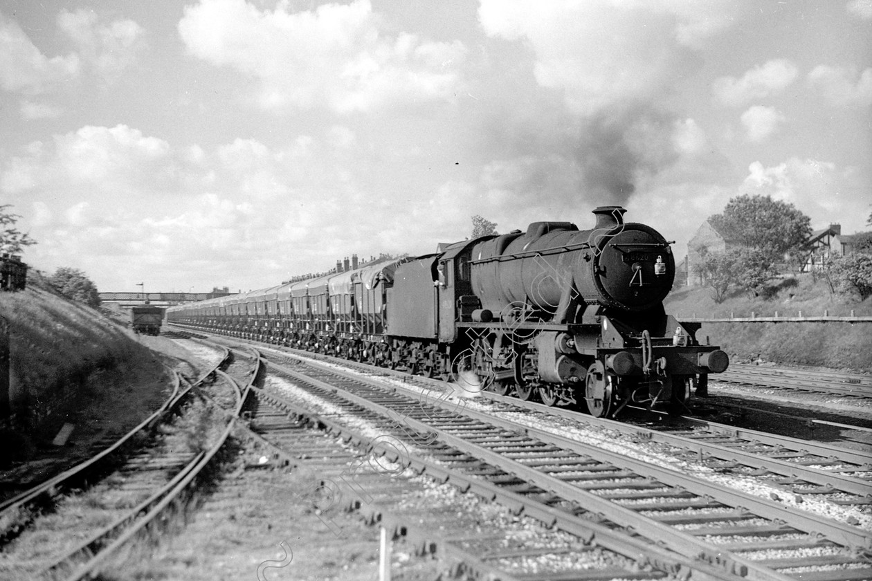 WD2067 
 ENGINE CLASS: Stanier Class 8 2-8-0 ENGINE NUMBER: 48620 LOCATION: Golborne DATE: 07 June 1967 COMMENTS: 
 Keywords: 07 June 1967, 48620, Cooperline, Golborne, Stanier Class 8 2-8-0, Steam, WD Cooper, locomotives, railway photography, trains