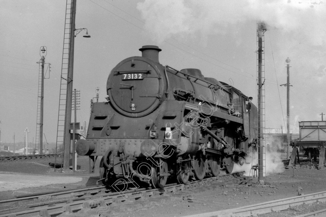 WD2443 
 ENGINE CLASS: BR 73000 4-6-0 ENGINE NUMBER: 73132 LOCATION: Patricroft DATE: 22 February 1962 COMMENTS: 
 Keywords: 22 February 1962, 73132, BR 73000 4-6-0, Cooperline, Patricroft, Steam, WD Cooper, locomotives, railway photography, trains