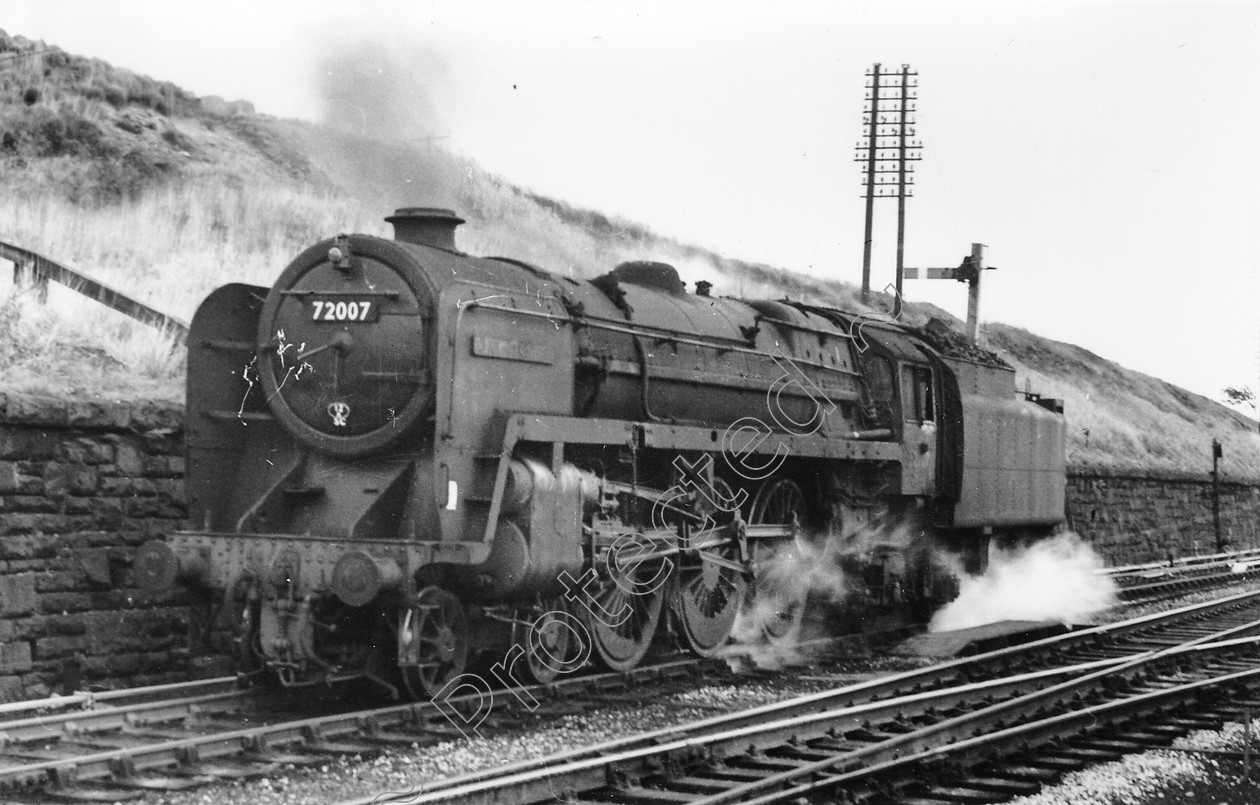 WD1385 
 ENGINE CLASS: Clan Class ENGINE NUMBER: 72007 LOCATION: Hellifield DATE: 12 October 1963 COMMENTS: 
 Keywords: 12 October 1963, 72007, Clan Class, Cooperline, Hellifield, Steam, WD Cooper, locomotives, railway photography, trains