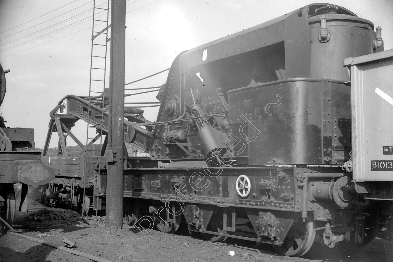 WD2771 
 ENGINE CLASS: Motive Power depots and cranes ENGINE NUMBER: LOCATION: Patricroft DATE: 16 March 1961 COMMENTS: 
 Keywords: 16 March 1961, Cooperline, Motive Power depots and cranes, Patricroft, Steam, WD Cooper, locomotives, railway photography, trains