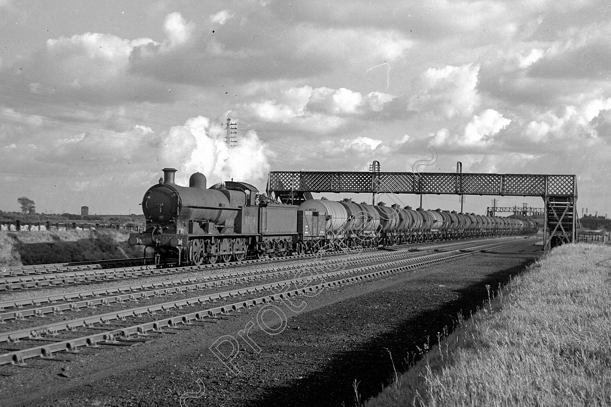 WD0924 
 ENGINE CLASS: L.N.W.R. ENGINE NUMBER: 9304 LOCATION: Golborne DATE: 20 August 1946 COMMENTS: 
 Keywords: 20 August 1946, 9304, Cooperline, Golborne, L.N.W.R., Steam, WD Cooper, locomotives, railway photography, trains