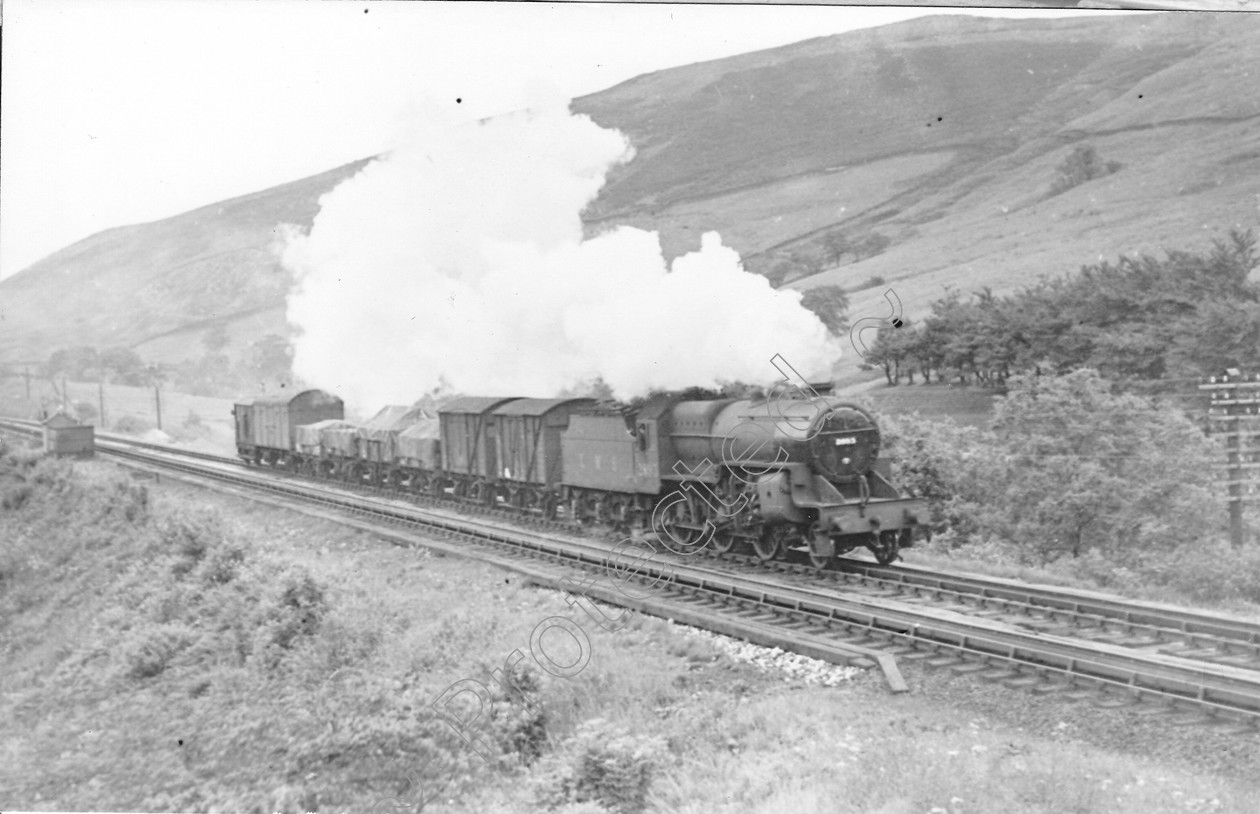 WD0660 
 ENGINE CLASS: Moguls 2-6-0 ENGINE NUMBER: 42893 LOCATION: Dillicar DATE: 02 August 1948 COMMENTS: 
 Keywords: 02 August 1948, 42893, Cooperline, Dillicar, Moguls 2-6-0, Steam, WD Cooper, locomotives, railway photography, trains