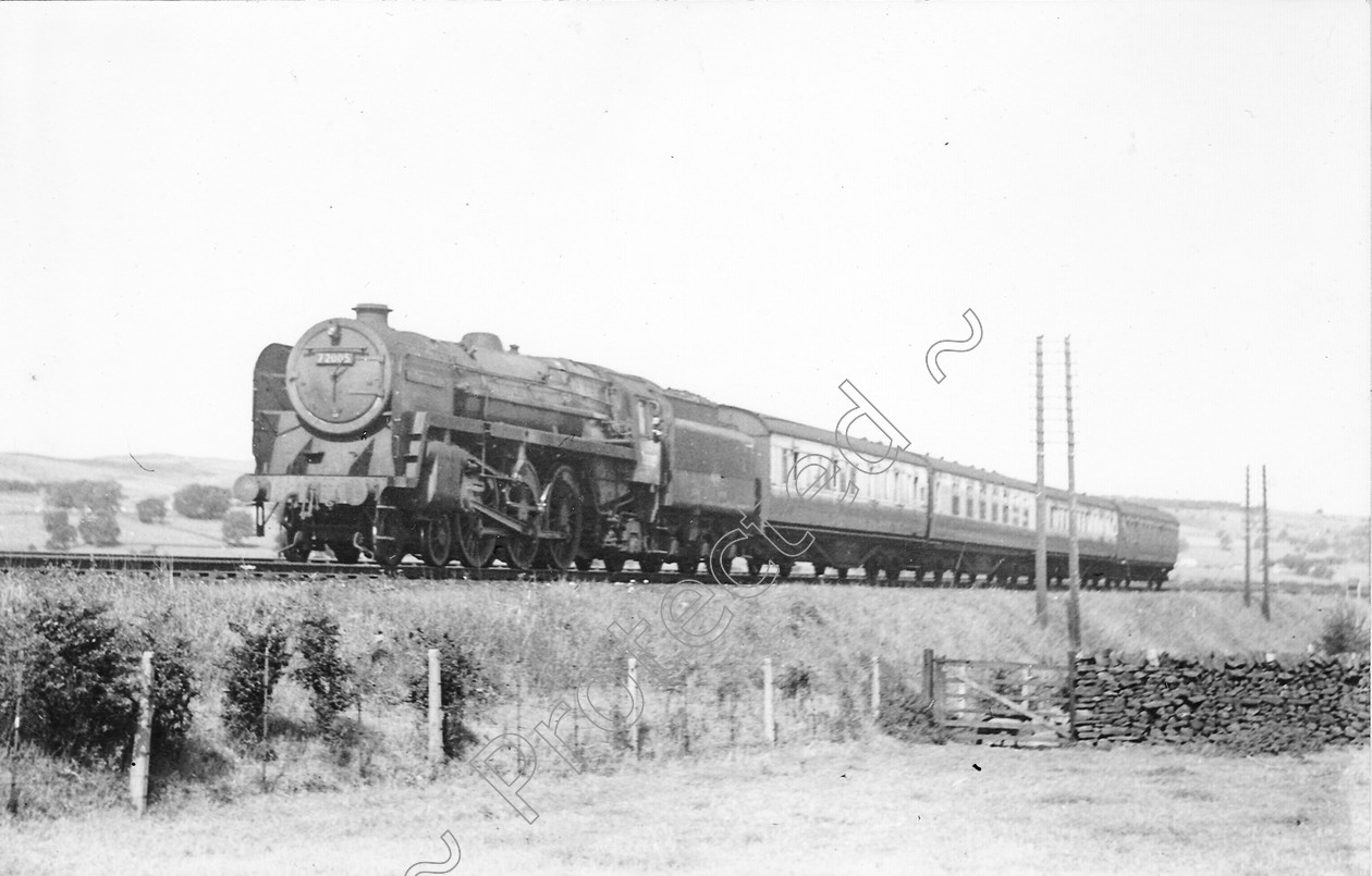 WD1379 
 ENGINE CLASS: Clan Class ENGINE NUMBER: 72005 LOCATION: Long Preston DATE: 00.07.1952 COMMENTS: 
 Keywords: 00.07.1952, 72005, Clan Class, Cooperline, Long Preston, Steam, WD Cooper, locomotives, railway photography, trains