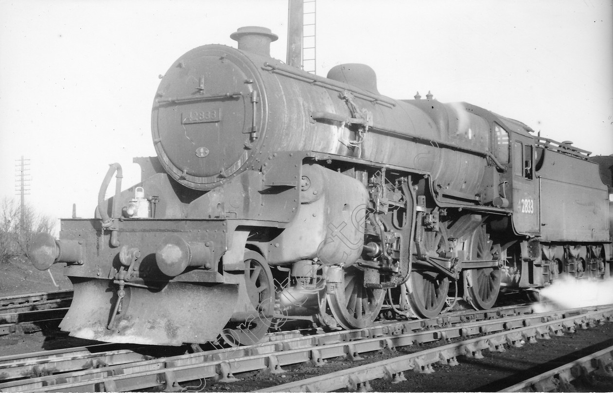 WD0646 
 ENGINE CLASS: Moguls 2-6-0 ENGINE NUMBER: 42833 LOCATION: Patricroft DATE: 19 December 1962 COMMENTS: 
 Keywords: 19 December 1962, 42833, Cooperline, Moguls 2-6-0, Patricroft, Steam, WD Cooper, locomotives, railway photography, trains