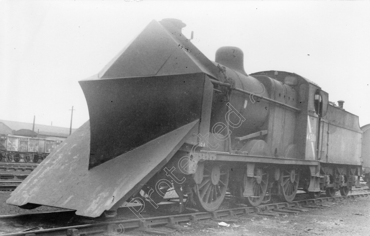 WD0746 
 ENGINE CLASS: Class 4 0-6-0 ENGINE NUMBER: 44300 LOCATION: Carnforth DATE: 21 May 1965 COMMENTS: 
 Keywords: 21 May 1965, 44300, Carnforth, Class 4 0-6-0, Cooperline, Steam, WD Cooper, locomotives, railway photography, trains