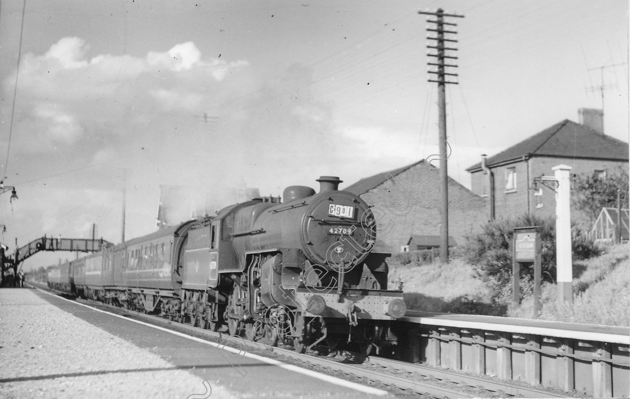 WD0610 
 ENGINE CLASS: Moguls 2-6-0 ENGINE NUMBER: 42709 LOCATION: Hest bank DATE: 22 July 1958 COMMENTS: 
 Keywords: 22 July 1958, 42709, Cooperline, Hest bank, Moguls 2-6-0, Steam, WD Cooper, locomotives, railway photography, trains