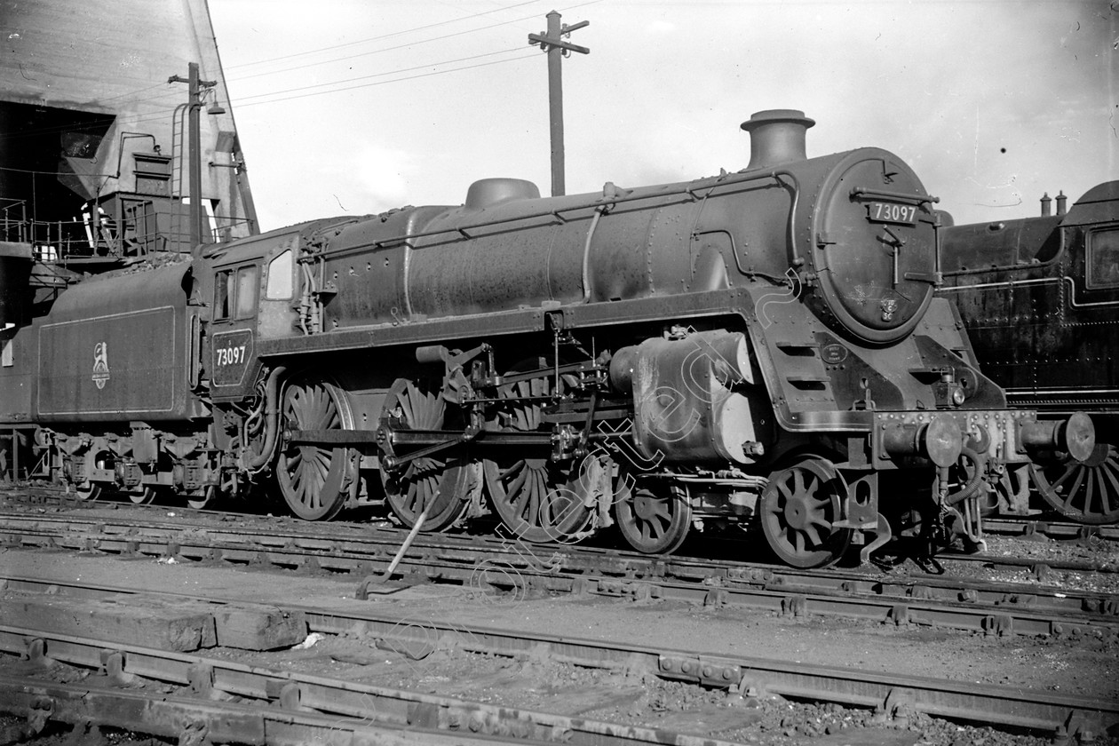 WD2427 
 ENGINE CLASS: BR 73000 4-6-0 ENGINE NUMBER: 73097 LOCATION: Patricroft DATE: 00.07.1957 COMMENTS: 
 Keywords: 00.07.1957, 73097, BR 73000 4-6-0, Cooperline, Patricroft, Steam, WD Cooper, locomotives, railway photography, trains