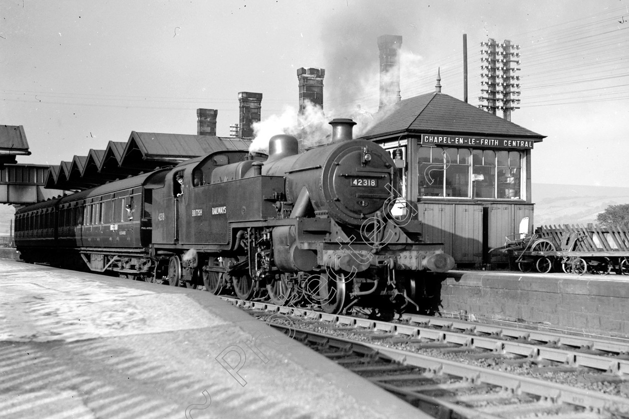 WD1034 
 ENGINE CLASS: 2-6-4 Tanks ENGINE NUMBER: 42318 LOCATION: Chapel-en-le-Firth DATE: 00.10.1950 COMMENTS: 
 Keywords: 00.10.1950, 2-6-4 Tanks, 42318, Chapel-en-le-Firth, Cooperline, Steam, WD Cooper, locomotives, railway photography, trains