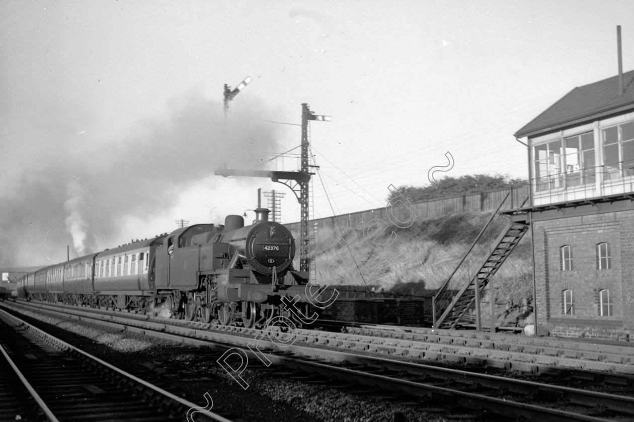 WD1041 
 ENGINE CLASS: 2-6-4 Tanks ENGINE NUMBER: 42376 LOCATION: Carnforth DATE: COMMENTS: 
 Keywords: 2-6-4 Tanks, 42376, Carnforth, Cooperline, Steam, WD Cooper, locomotives, railway photography, trains