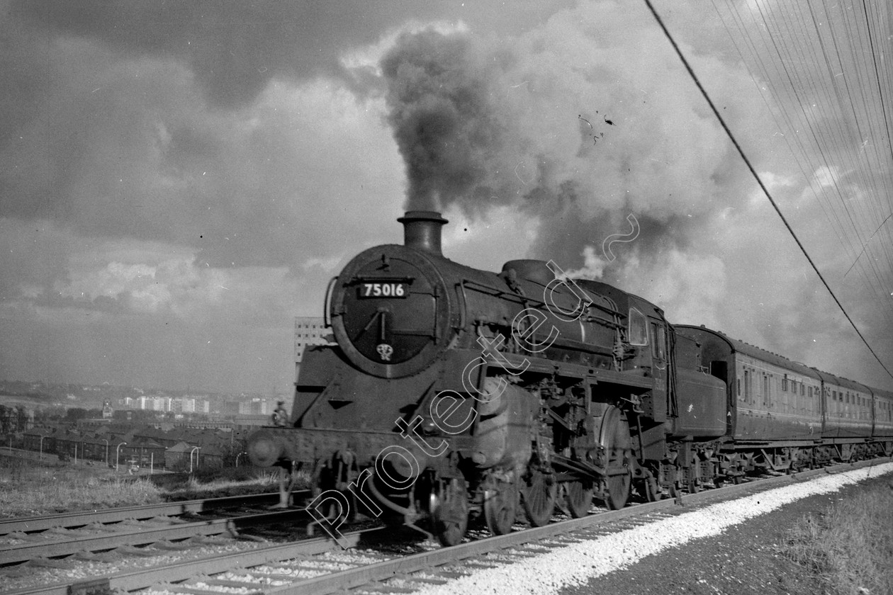 WD2469 
 ENGINE CLASS: BR 75000 4-6-0 ENGINE NUMBER: 75016 LOCATION: Pendlebury Bank DATE: 11 April 1960 COMMENTS: 
 Keywords: 11 April 1960, 75016, BR 75000 4-6-0, Cooperline, Pendlebury Bank, Steam, WD Cooper, locomotives, railway photography, trains