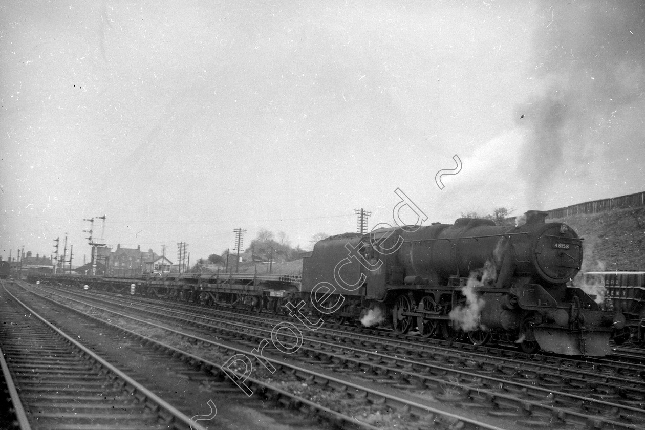 WD2017 
 ENGINE CLASS: Stanier Class 8 2-8-0 ENGINE NUMBER: 48158 LOCATION: Carnforth DATE: 12 May 1962 COMMENTS: 
 Keywords: 12 May 1962, 48158, Carnforth, Cooperline, Stanier Class 8 2-8-0, Steam, WD Cooper, locomotives, railway photography, trains