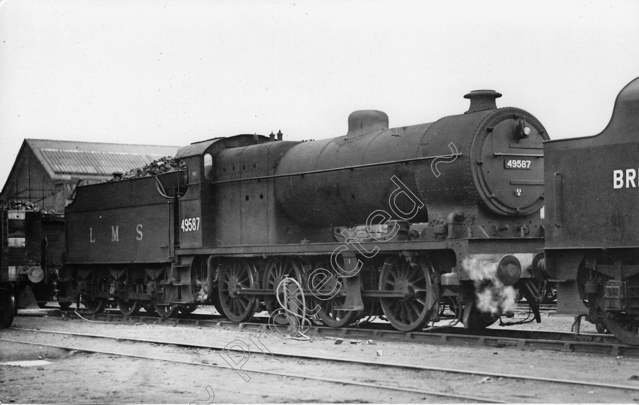 WD0766 
 ENGINE CLASS: Fowler 0-8-0 ENGINE NUMBER: 49587 LOCATION: Newton Heath DATE: 12 August 1948 COMMENTS: 
 Keywords: 12 August 1948, 49587, Cooperline, Fowler 0-8-0, Newton Heath, Steam, WD Cooper, locomotives, railway photography, trains